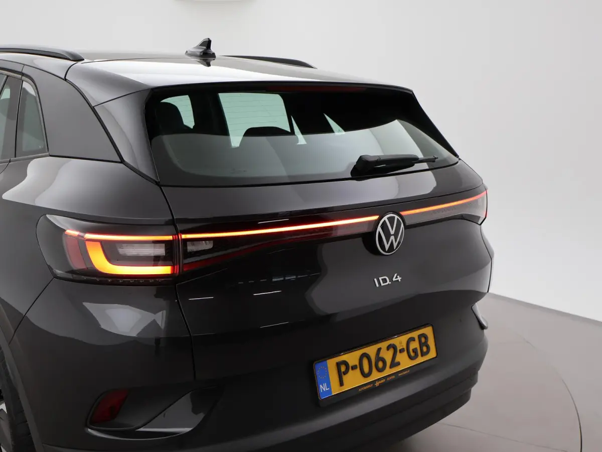 PRO 77 kWh + ADAPTIVE CRUISE | STUURVERW. 91% SOH | STOELVERW. | SFEERVERLICHTING | DRAADLOZE CARPLAY