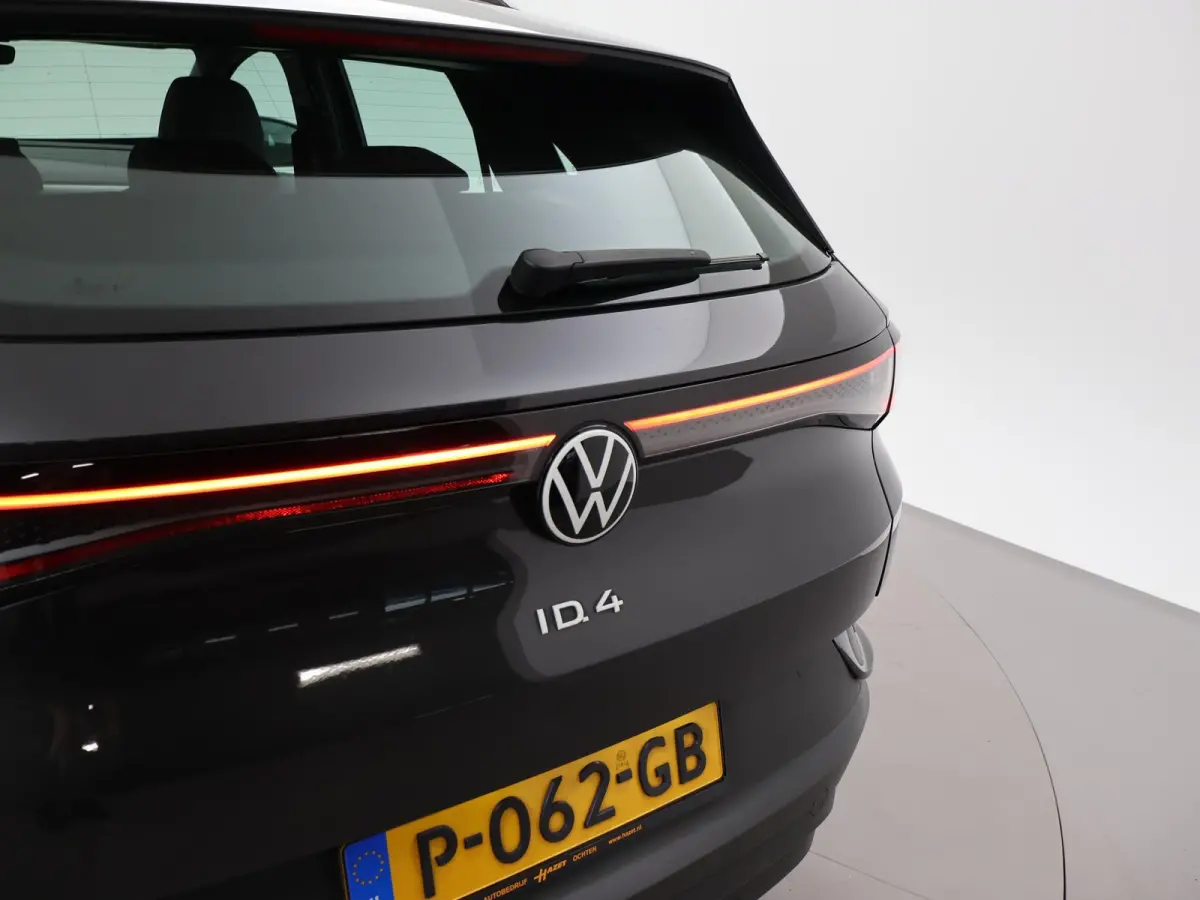 PRO 77 kWh + ADAPTIVE CRUISE | STUURVERW. 91% SOH | STOELVERW. | SFEERVERLICHTING | DRAADLOZE CARPLAY