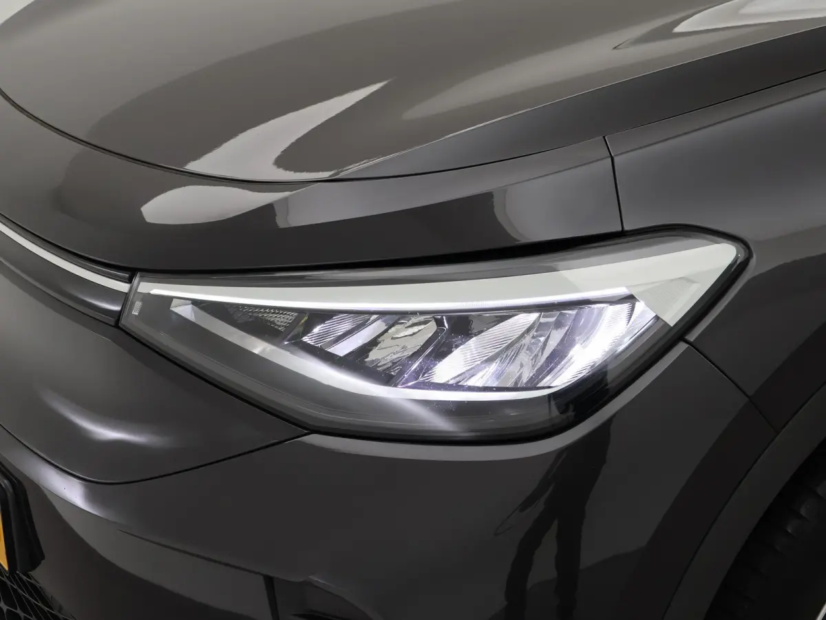 PRO 77 kWh + ADAPTIVE CRUISE | STUURVERW. 91% SOH | STOELVERW. | SFEERVERLICHTING | DRAADLOZE CARPLAY