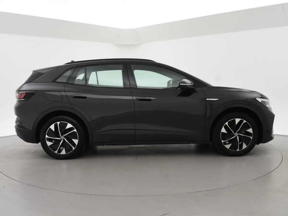 PRO 77 kWh + ADAPTIVE CRUISE | STUURVERW. 91% SOH | STOELVERW. | SFEERVERLICHTING | DRAADLOZE CARPLAY