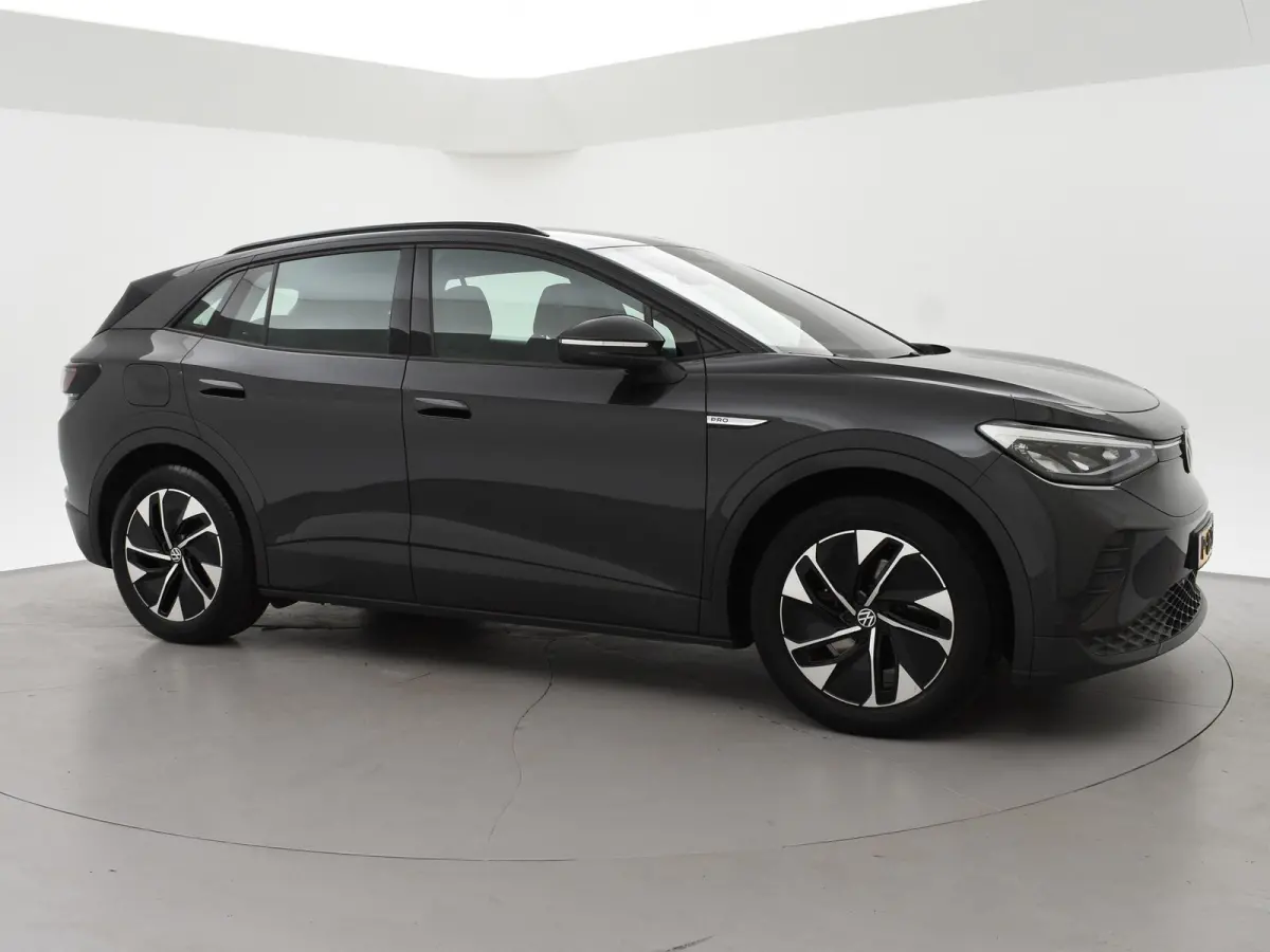 PRO 77 kWh + ADAPTIVE CRUISE | STUURVERW. 91% SOH | STOELVERW. | SFEERVERLICHTING | DRAADLOZE CARPLAY