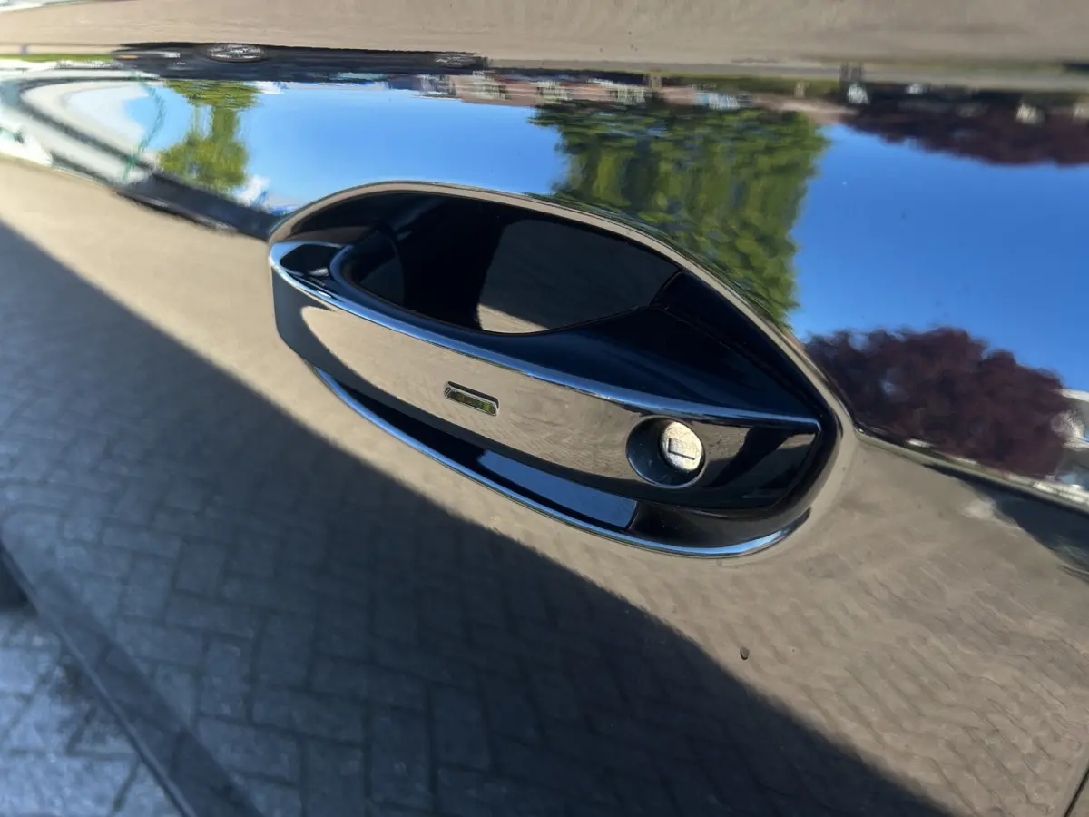 Grand PHEV Titanium | Winterpack | Adap. Cruise Control | Camera | 7 Persoons | CarPlay |