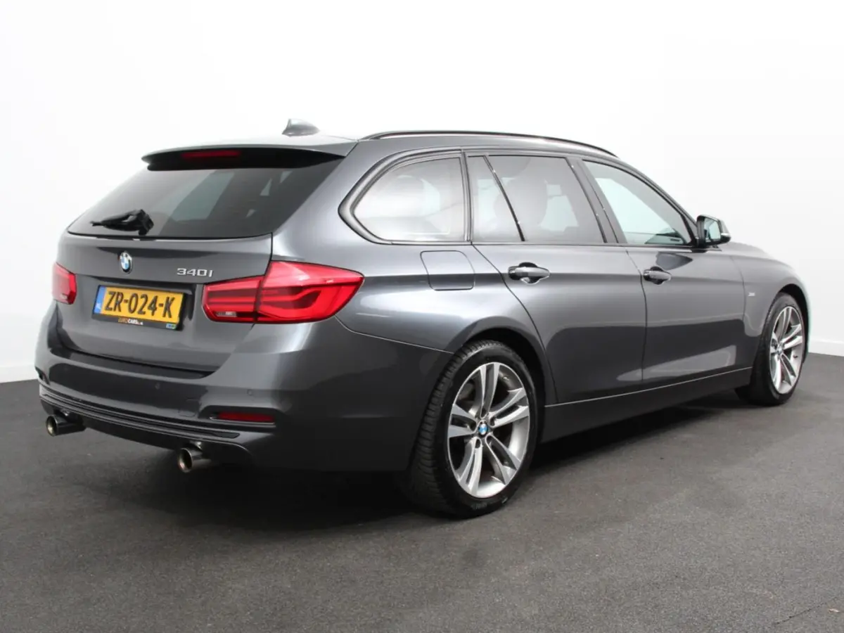 340i 326 pk Automaat Sport-Line Navigatie Climate Control Cruise Control Led Elektrische bedienbare achterklep Extra Getint Glas Lichtmetalen velgen 18" Stoelverwarming