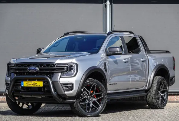 Wildtrak 2.3PHEV 280Pk Aut. | Plug In Hybride | Double Cab | 5-Persoons | Bullbar | Wielkastverbreders | Trekhaak | Rollertop | 22''