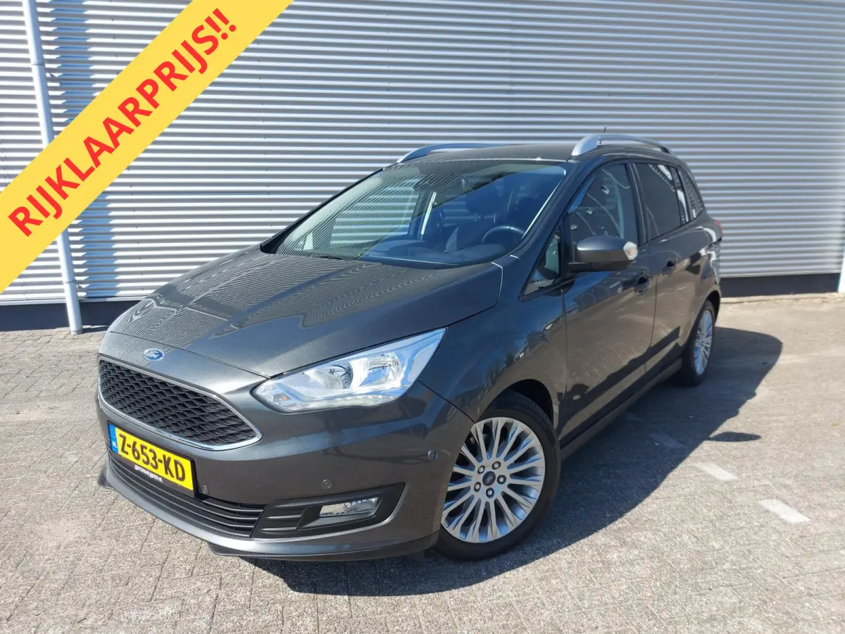 1.0 Titanium, airco,cruise,navigatie/camera,stoel/stuurverwarming,voorruit verwarmd,parkeersensoren,