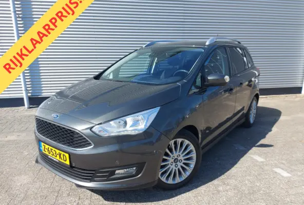 1.0 Titanium, airco,cruise,navigatie/camera,stoel/stuurverwarming,voorruit verwarmd,parkeersensoren,