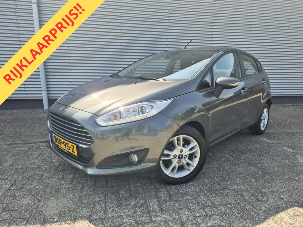 1.0 Titanium Airco,parkeersensoren achter,lichtmetalen wielen,