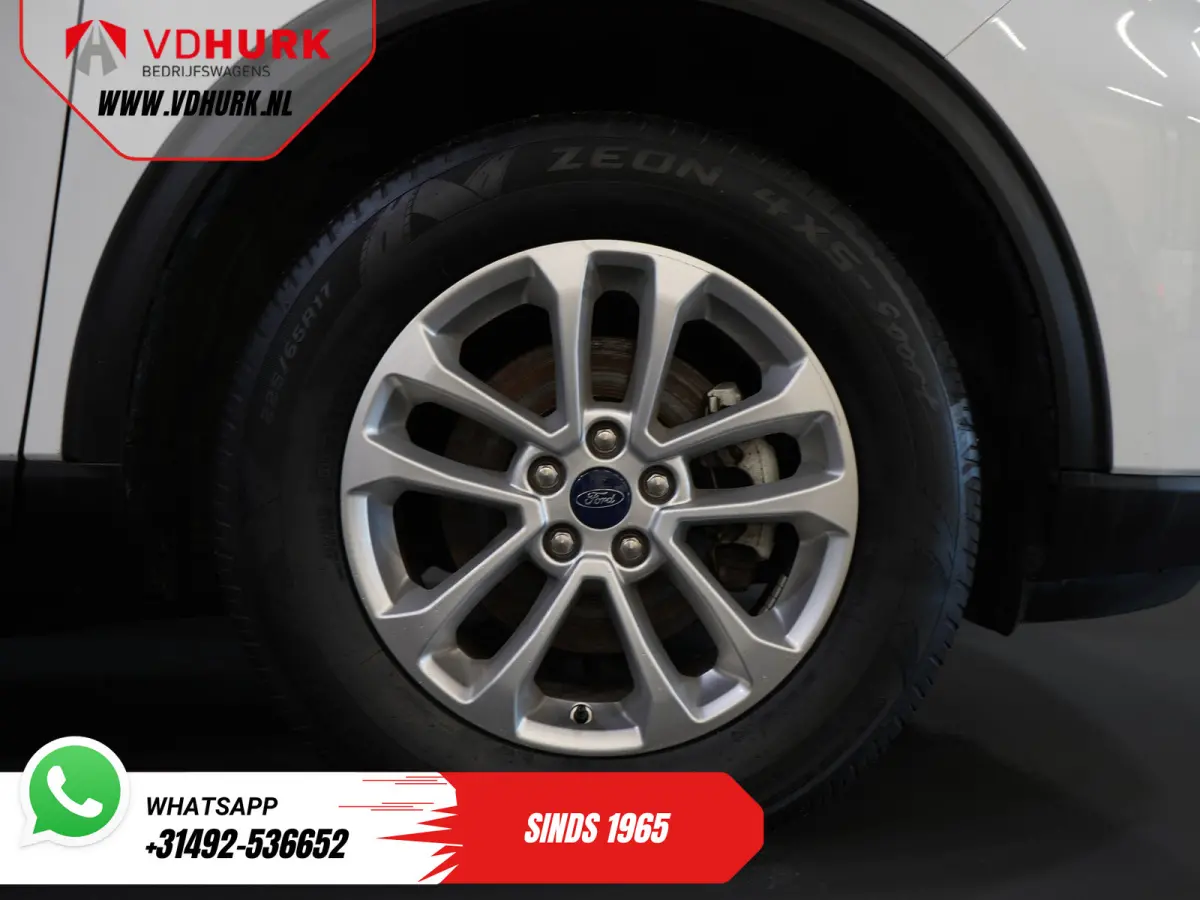2.5 PHEV 225 pk Titanium Stoelverw./ Stuurverw./ Navi/ Carplay/ Camera/ PDC/ Climate