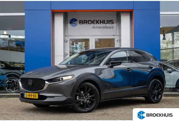 2.0 e-SkyActiv-X M Hybrid Homura | Trekhaak | Head-up | Camera | Apple Carplay/Android Auto | Cruise adaptief | Stuur+stoel verwarming | Dodehoek detectie | Achteruitrijcamera | Afneembare T