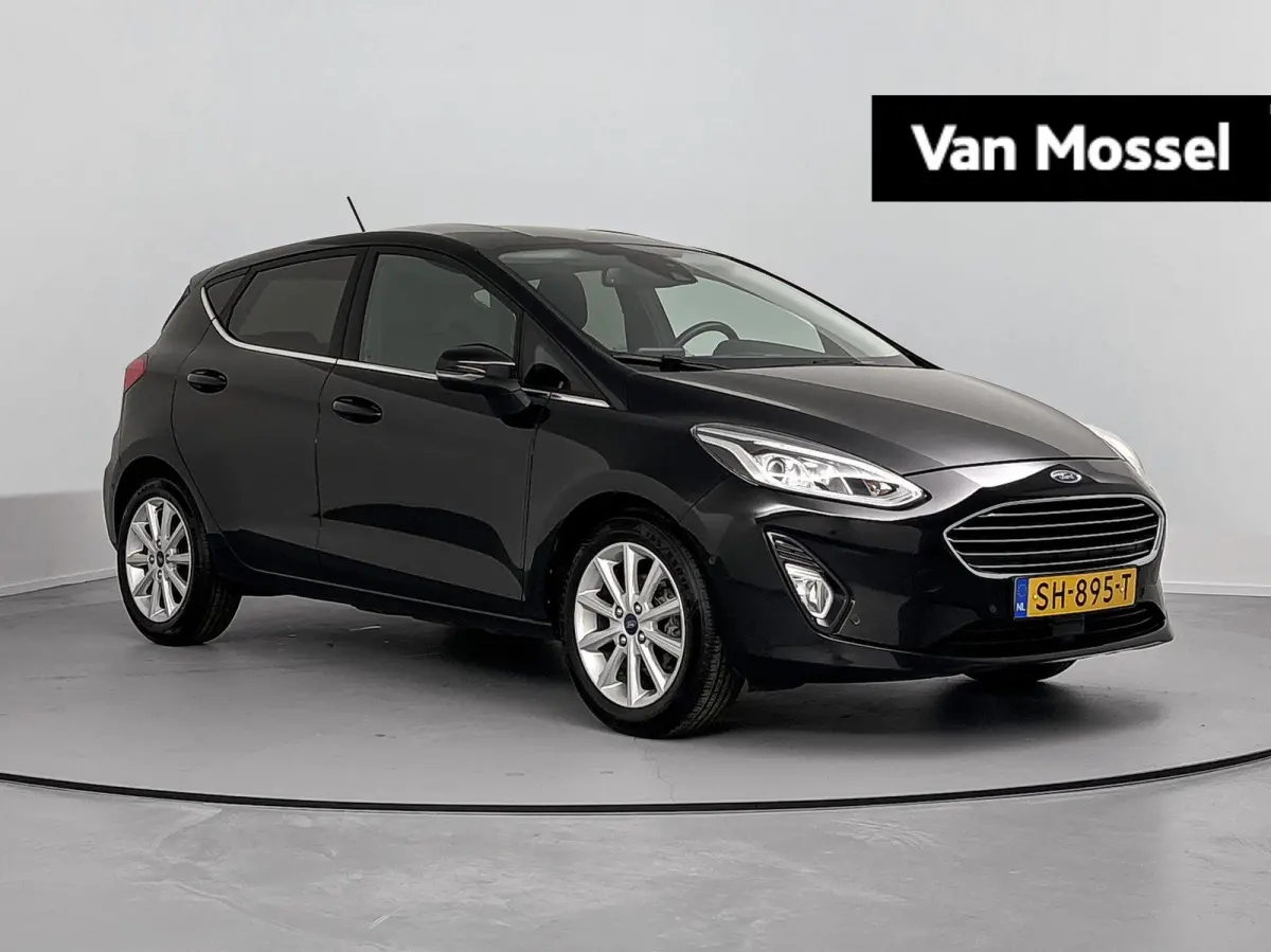 1.0 EcoBoost Titanium Airco | Apple Carplay/Android Auto | Bluetooth | Cruise Control | Hill Hold Functie | LED Dagrijverlichting | Lichtmetalen Velgen 16'' | Multimedia-Voorbereiding | Rege