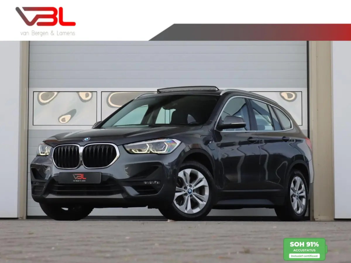 xDrive25e High Executive | SOH 91% | Trekhaak | Panoramadak