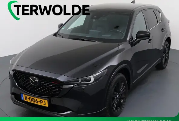 2.0 SkyActiv-G 165 Homura | Trekhaak | Geventileerd Leder | Verwarmde achterbank |