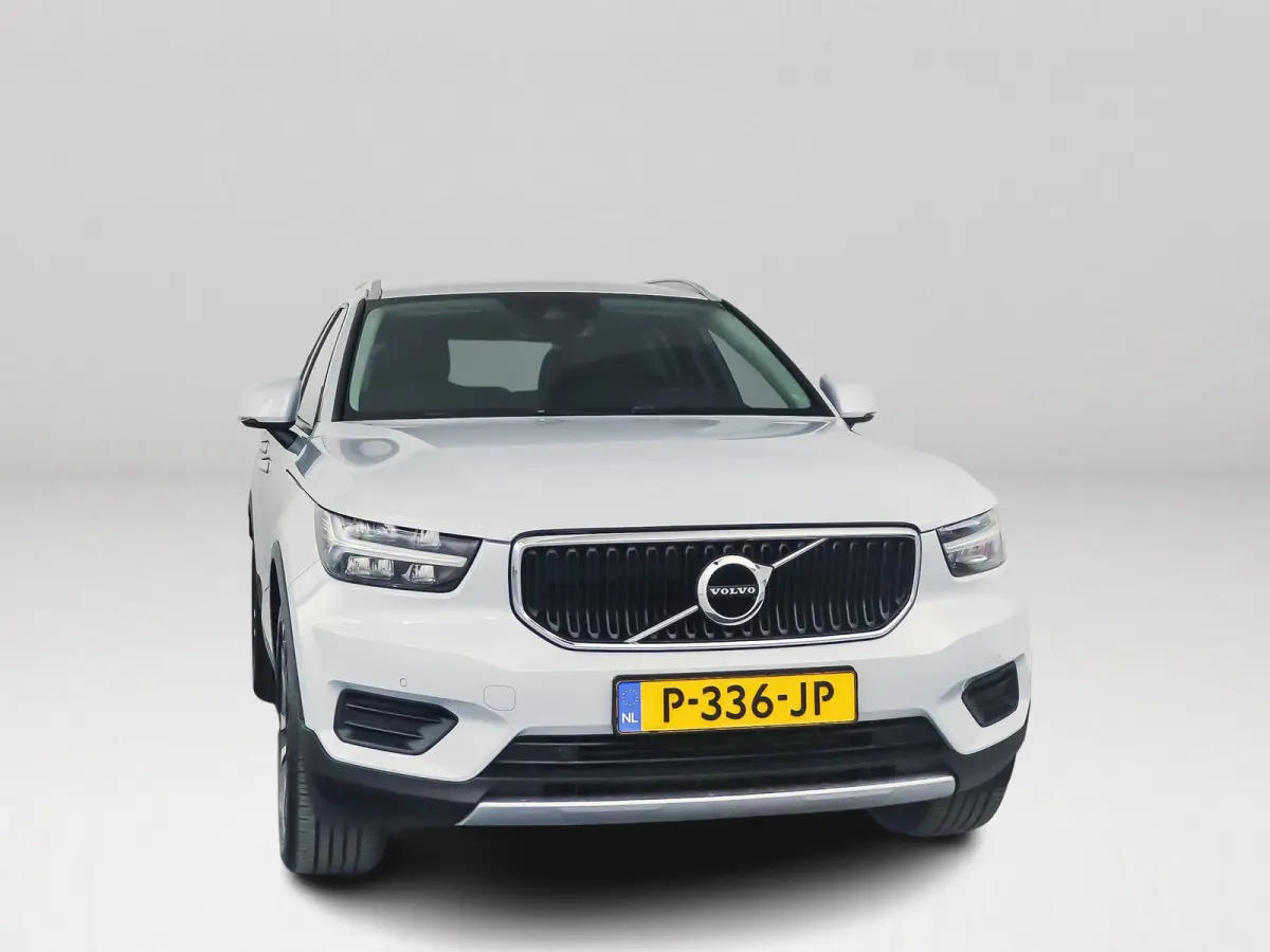T2 Momentum | Parkeercamera | Cruise control | Navigatie | Climate control