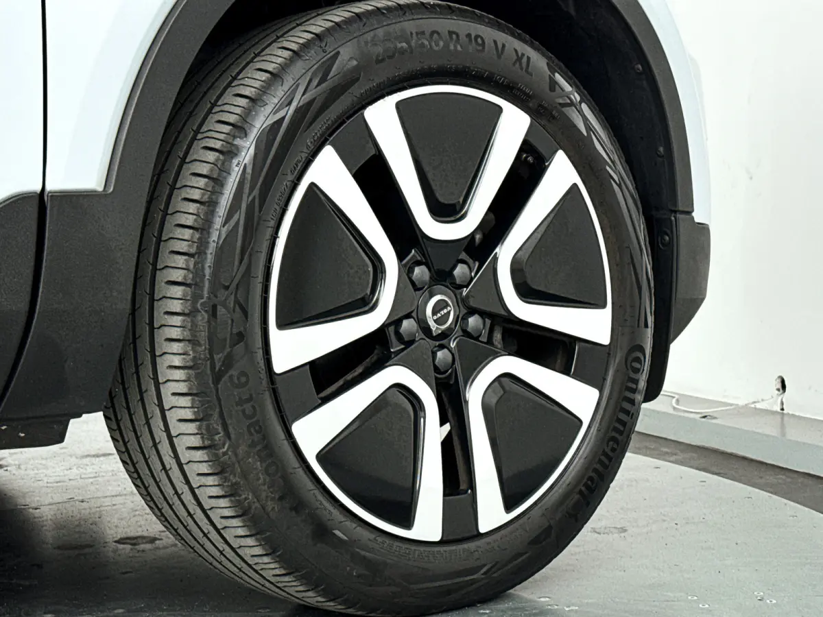 T2 Momentum | Parkeercamera | Cruise control | Navigatie | Climate control