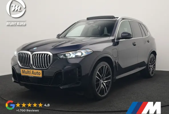 xDrive50e M Sport PHEV 490pk Dealer O.H. | Panodak Sky Lounge | Luchtvering | Head Up | 360 Camera | Harman / Kardon | Nappa Lederen Comfortstoelen Memory & Verwarmd | Carbon Schwarz | Apple