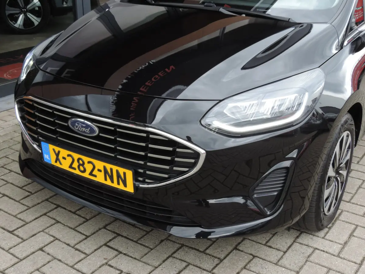 1.0-T 125PK Hybrid Titanium 48.000km | NLauto | Winterpack | ECC | LED kopl | CarPlay | Bluetooth | PDC | DAB