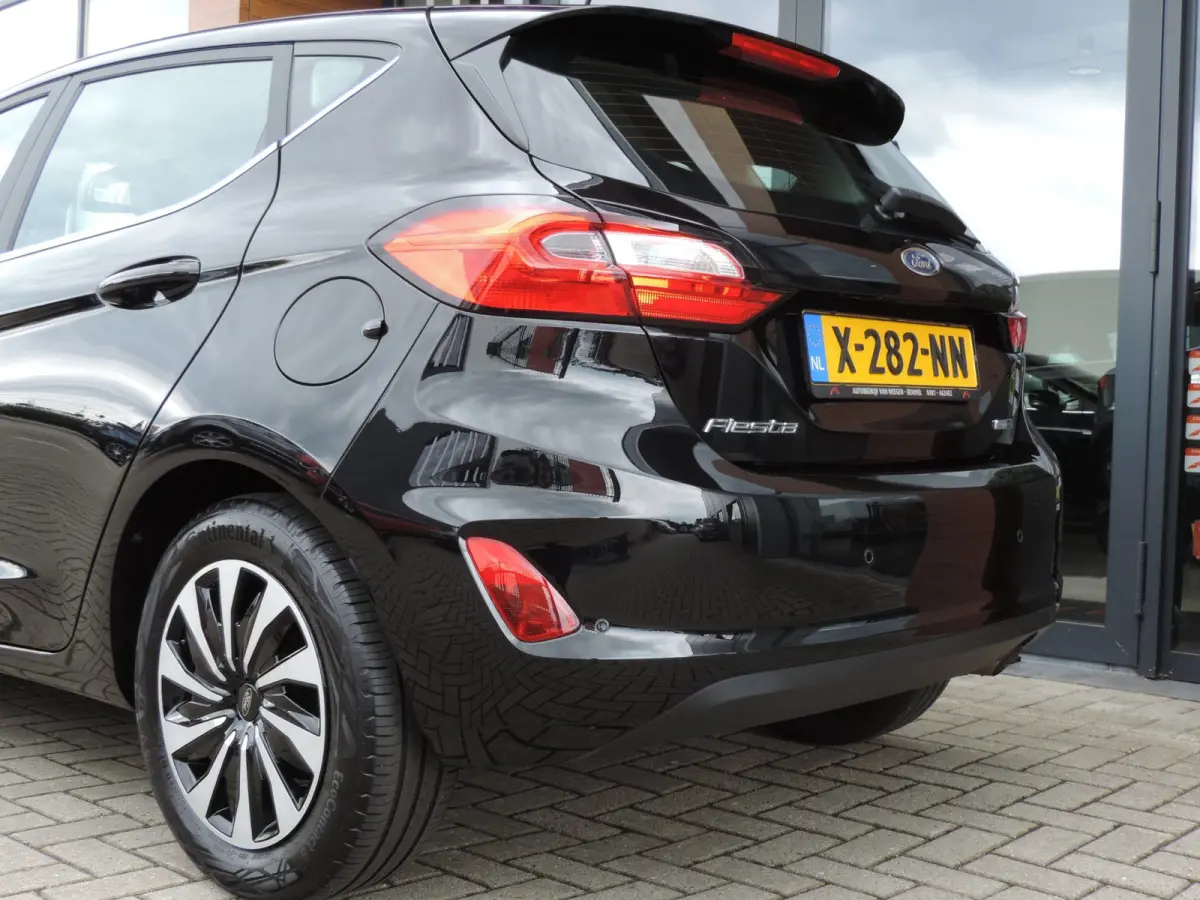 1.0-T 125PK Hybrid Titanium 48.000km | NLauto | Winterpack | ECC | LED kopl | CarPlay | Bluetooth | PDC | DAB