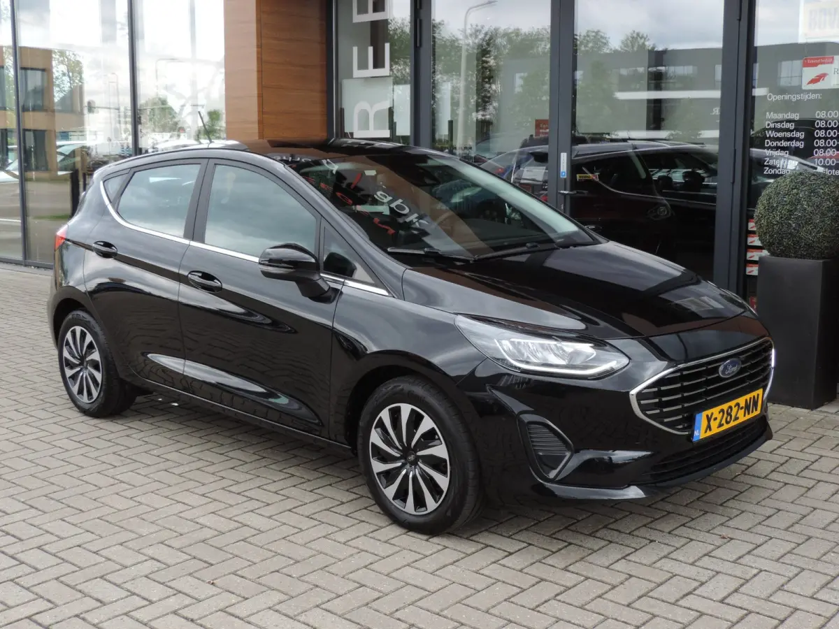 1.0-T 125PK Hybrid Titanium 48.000km | NLauto | Winterpack | ECC | LED kopl | CarPlay | Bluetooth | PDC | DAB
