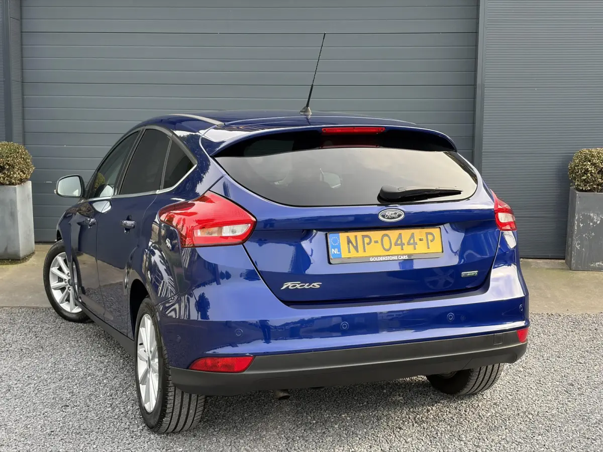1.0 Titanium 2e Eigenaar,Dealer Onderhouden,Navi,Pdc V+A,125pk,Clima,Cruise,6 Bak,Lm velgen,Net beurt gehad,Apk tot 04-2027