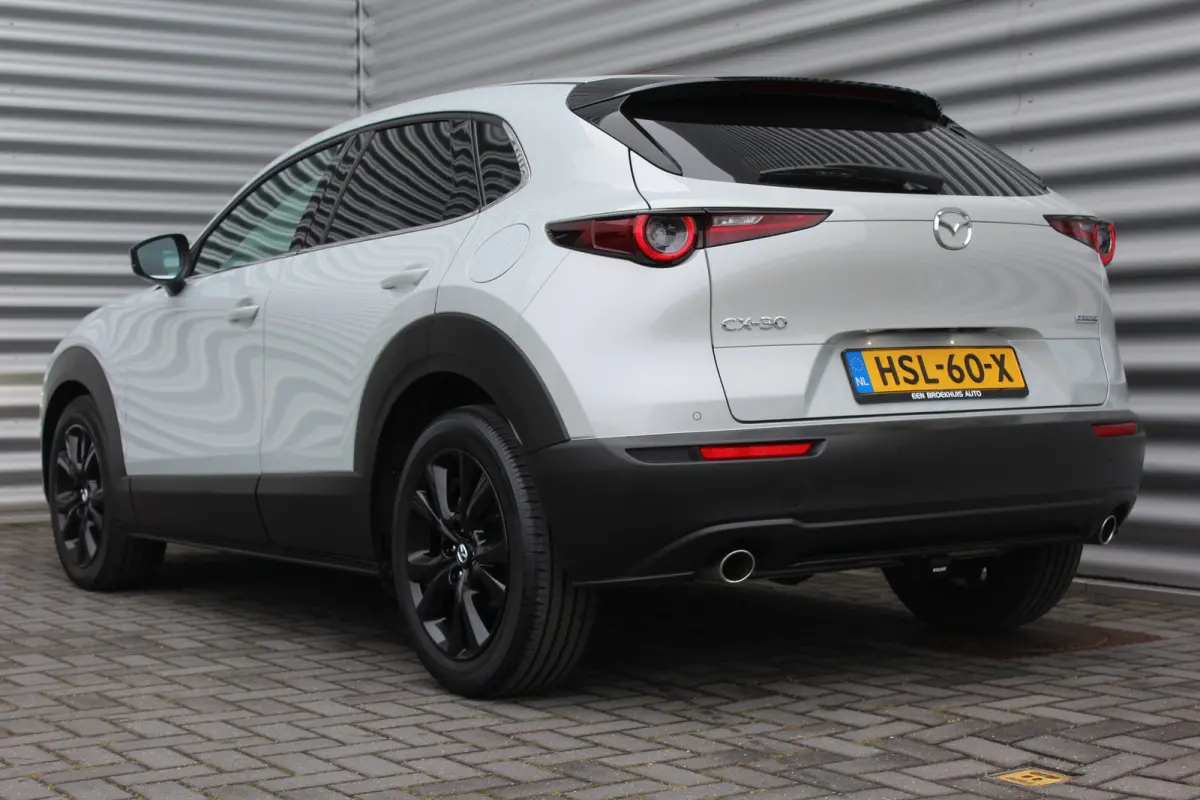 2.5 e-SKYACTIV-G M HYBRID 140PK HOMURA AUTOMAAT / NAVI / CLIMA / FULL-LED / PDC / 18" LMV / KEYLESS / AFN. TREKHAAK / WINTERPAKKET / ADAPT. CRUISECONTROL / 1E EIGENAAR / NIEUWSTAAT !!