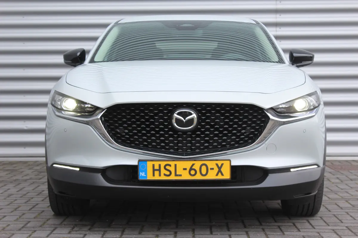 2.5 e-SKYACTIV-G M HYBRID 140PK HOMURA AUTOMAAT / NAVI / CLIMA / FULL-LED / PDC / 18" LMV / KEYLESS / AFN. TREKHAAK / WINTERPAKKET / ADAPT. CRUISECONTROL / 1E EIGENAAR / NIEUWSTAAT !!