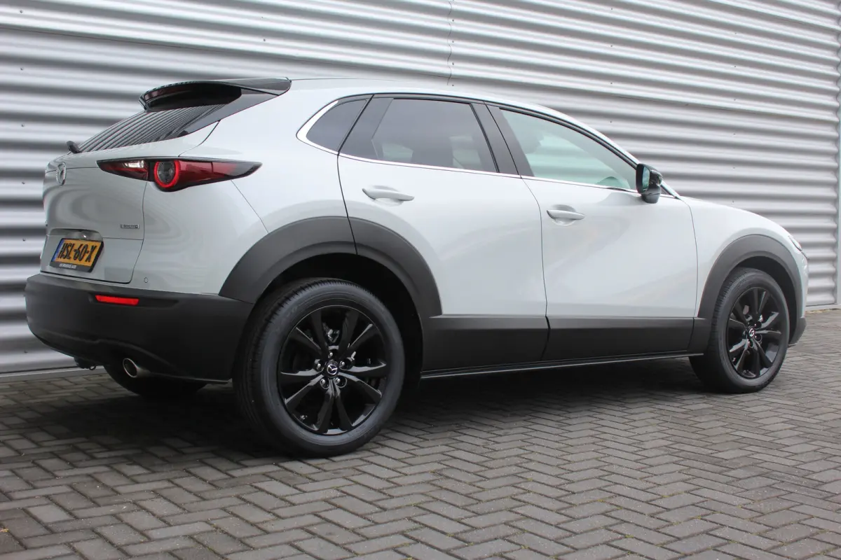 2.5 e-SKYACTIV-G M HYBRID 140PK HOMURA AUTOMAAT / NAVI / CLIMA / FULL-LED / PDC / 18" LMV / KEYLESS / AFN. TREKHAAK / WINTERPAKKET / ADAPT. CRUISECONTROL / 1E EIGENAAR / NIEUWSTAAT !!