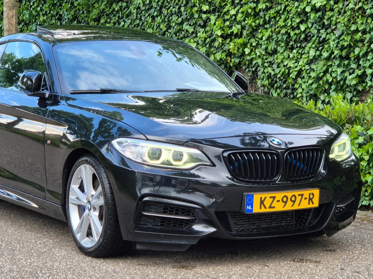 M2 M235i High Executive Schuifdak GR Navi H&K Stuurverwarming NAP