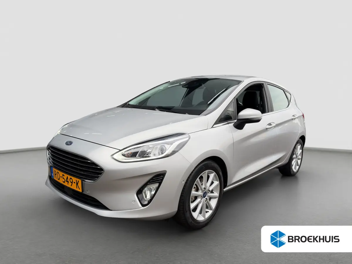 1.0 100pk EcoBoost Titanium | Camera | Adaptive cruise controle | B&O Audio | Voorruitverwarming | Carplay | Parkeersensoren voor en achter | Navigatie | Climate controle