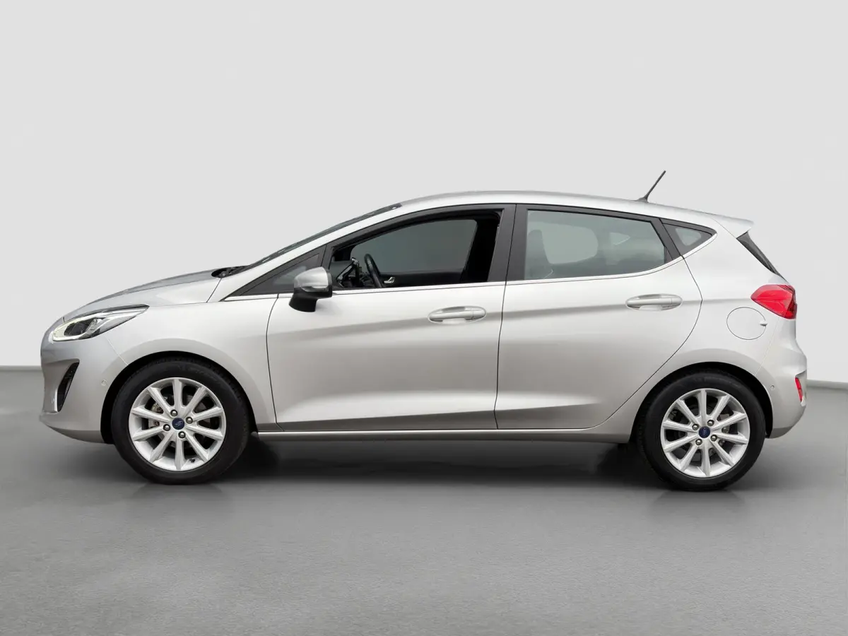 1.0 100pk EcoBoost Titanium | Camera | Adaptive cruise controle | B&O Audio | Voorruitverwarming | Carplay | Parkeersensoren voor en achter | Navigatie | Climate controle