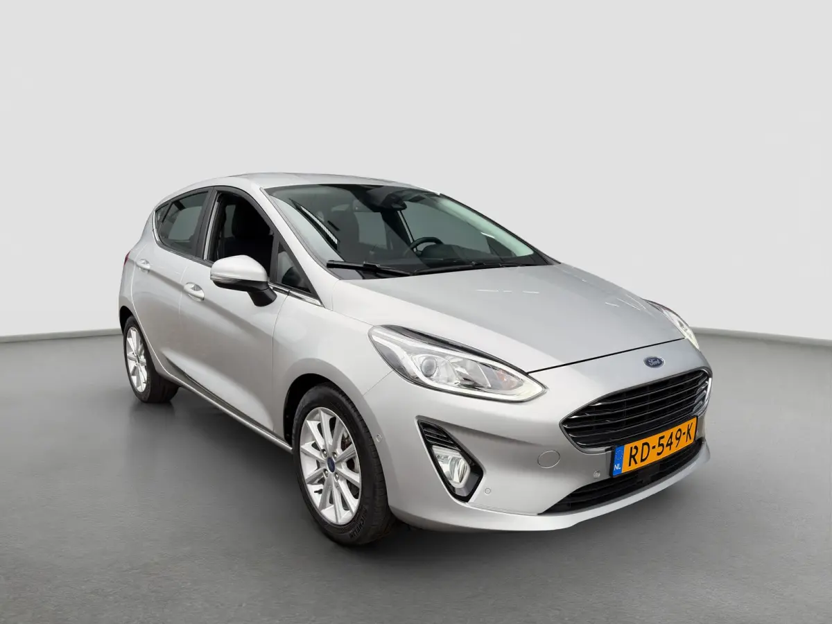 1.0 100pk EcoBoost Titanium | Camera | Adaptive cruise controle | B&O Audio | Voorruitverwarming | Carplay | Parkeersensoren voor en achter | Navigatie | Climate controle
