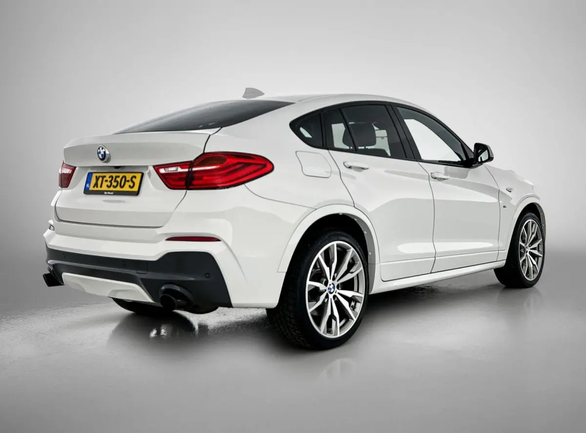 M40i High Executive | 360 PK | SCHUIFDAK | LEDER | HARMAN-KARDON AUDIO | ELEKTRISCHE BESTUURDERSSTOEL MET GEHEUGEN | ADAPTIVE CRUISE CONTROL | NAVIGATIE | ACHTERUITRIJCAMERA | ELEKTRISCHE AC