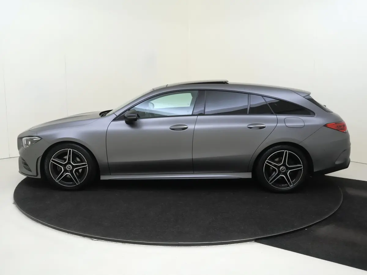 180 Business Solution AMG Panoramadak / Keyless / Nightpakket / Parkeercamera / Sfeerverlichting / MANUFAKTUR Berggrijs Matte (origineel)