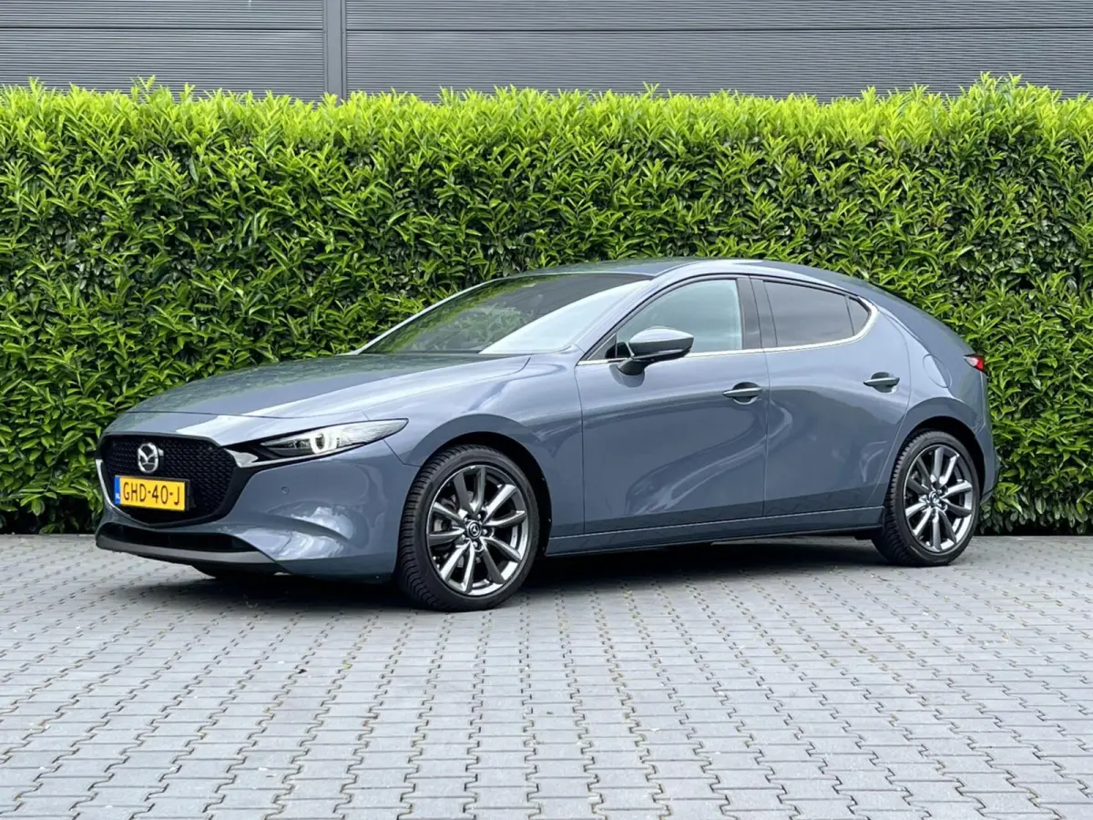 2.0 e-SkyActiv-X M Hybrid 180 Luxury, BOSE SOUND, NAVIGATIE, KEYLESS, CRUISE CONTROL, CLIMATE CONTROL, STOEL/STUURVERWARMING, LED, DAB, PDC, LICHTMETAAL 18"