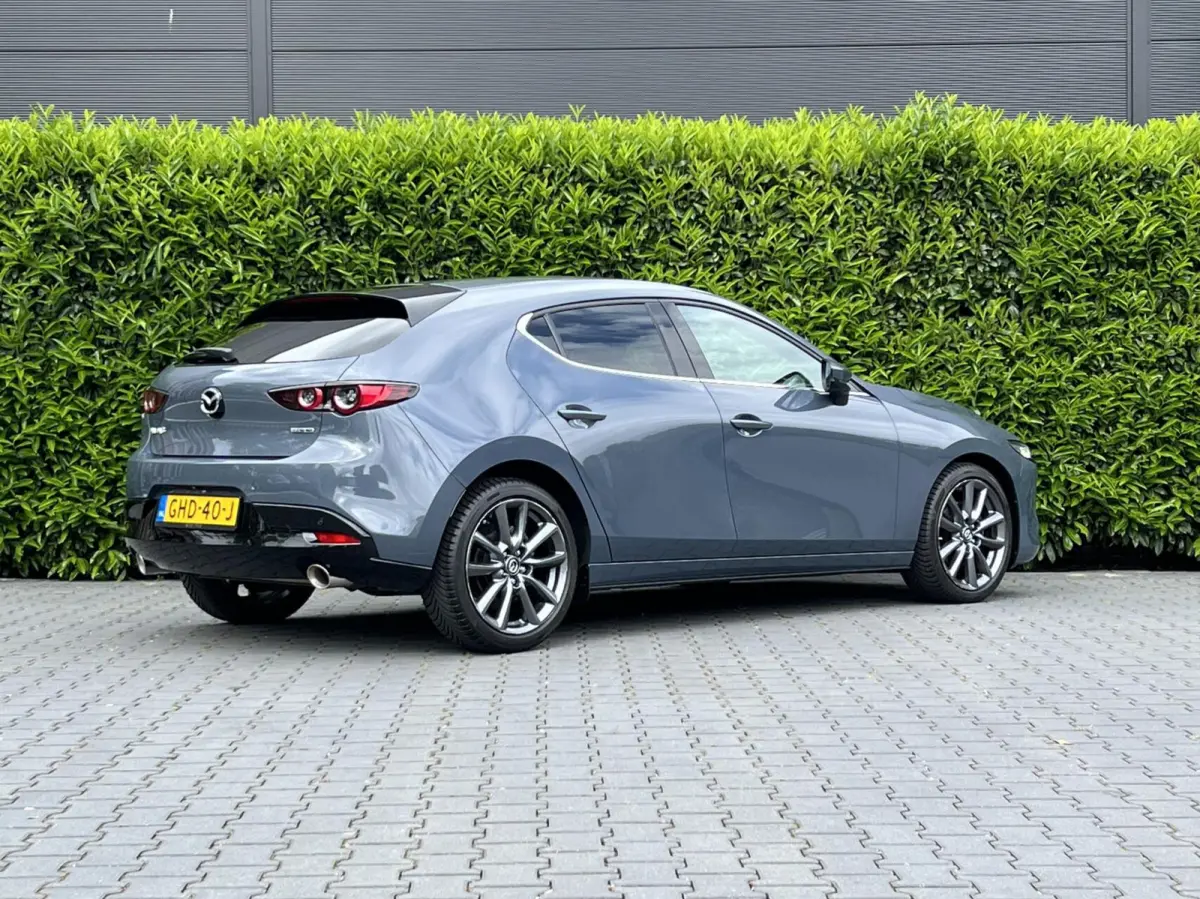 2.0 e-SkyActiv-X M Hybrid 180 Luxury, BOSE SOUND, NAVIGATIE, KEYLESS, CRUISE CONTROL, CLIMATE CONTROL, STOEL/STUURVERWARMING, LED, DAB, PDC, LICHTMETAAL 18"