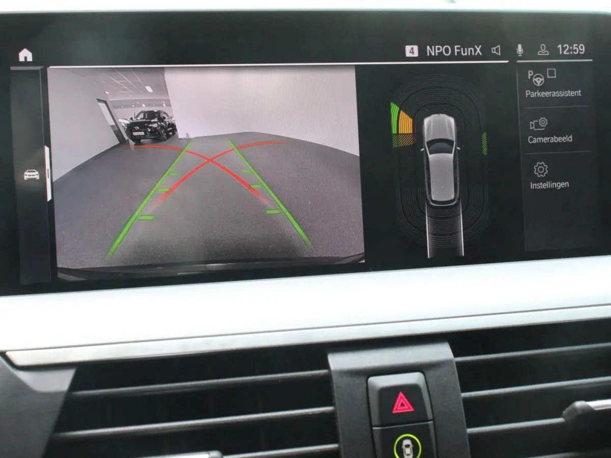 xDrive30e Plug in Hybride Advantage Automaat Navigatie Climate Control Adaptieve Cruise Control Head up display Led Dab Parkeer sensoren V+A Stoelverwarming Camera