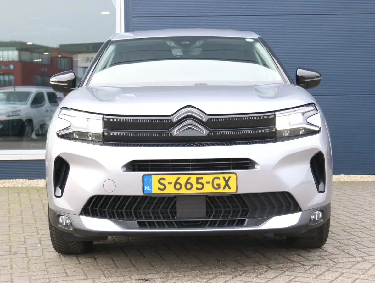 225pk Plug-in Hybrid Feel | 1ste eigenaar | Camera | Dodehoekdetectie | LED lampen | LEER/Stof | 18"LMV | AUTOMAAT
