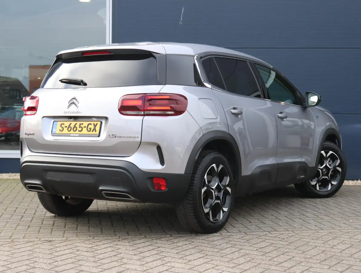 225pk Plug-in Hybrid Feel | 1ste eigenaar | Camera | Dodehoekdetectie | LED lampen | LEER/Stof | 18"LMV | AUTOMAAT
