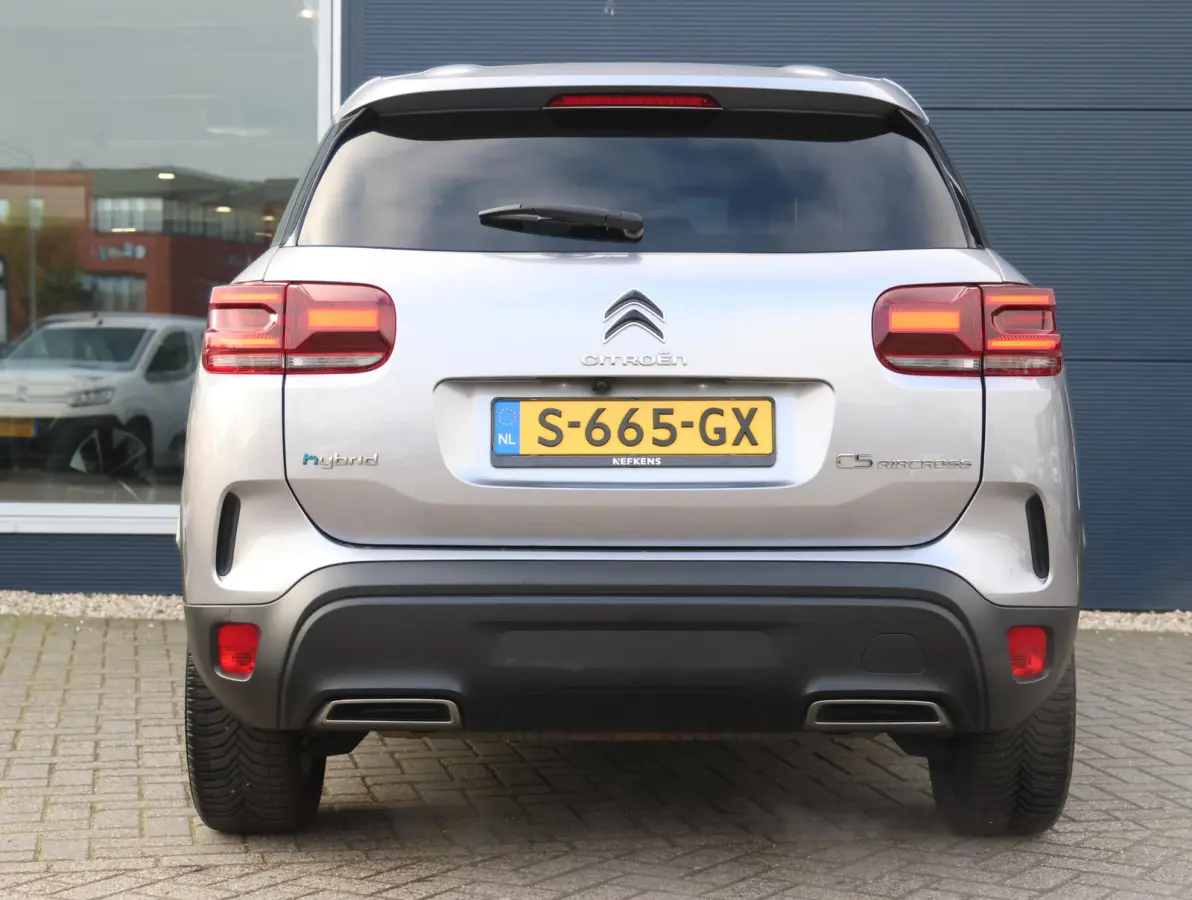 225pk Plug-in Hybrid Feel | 1ste eigenaar | Camera | Dodehoekdetectie | LED lampen | LEER/Stof | 18"LMV | AUTOMAAT