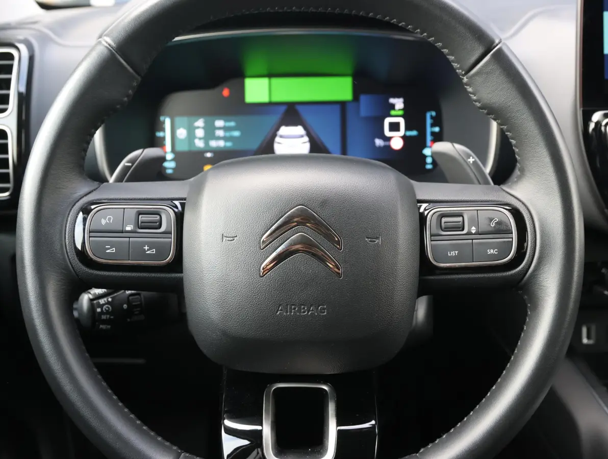 225pk Plug-in Hybrid Feel | 1ste eigenaar | Camera | Dodehoekdetectie | LED lampen | LEER/Stof | 18"LMV | AUTOMAAT