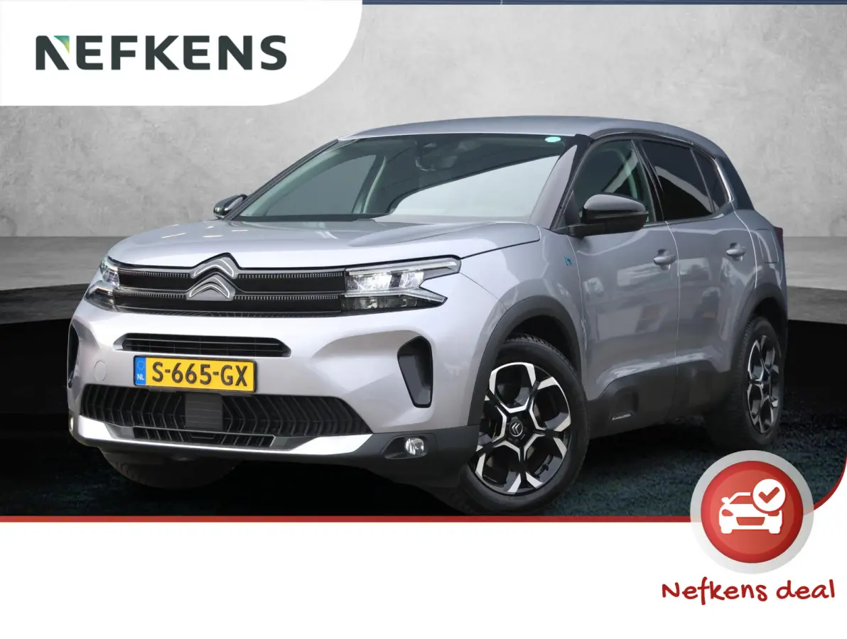 225pk Plug-in Hybrid Feel | 1ste eigenaar | Camera | Dodehoekdetectie | LED lampen | LEER/Stof | 18"LMV | AUTOMAAT