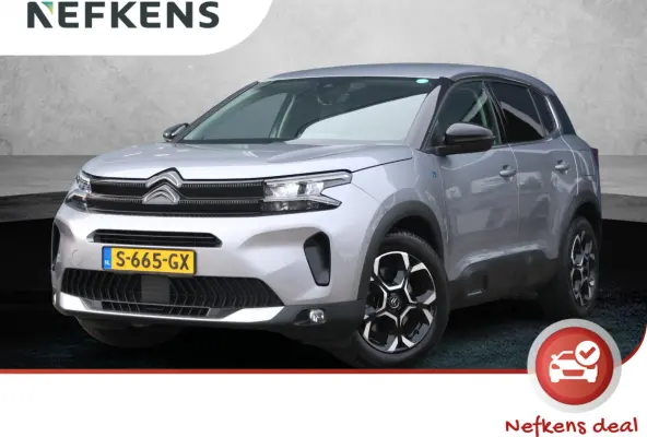 225pk Plug-in Hybrid Feel | 1ste eigenaar | Camera | Dodehoekdetectie | LED lampen | LEER/Stof | 18"LMV | AUTOMAAT