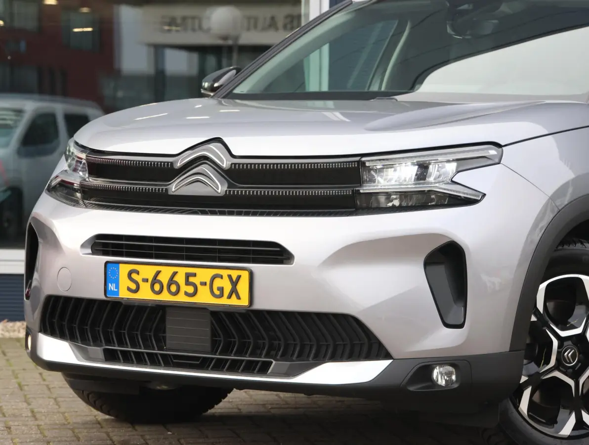 225pk Plug-in Hybrid Feel | 1ste eigenaar | Camera | Dodehoekdetectie | LED lampen | LEER/Stof | 18"LMV | AUTOMAAT