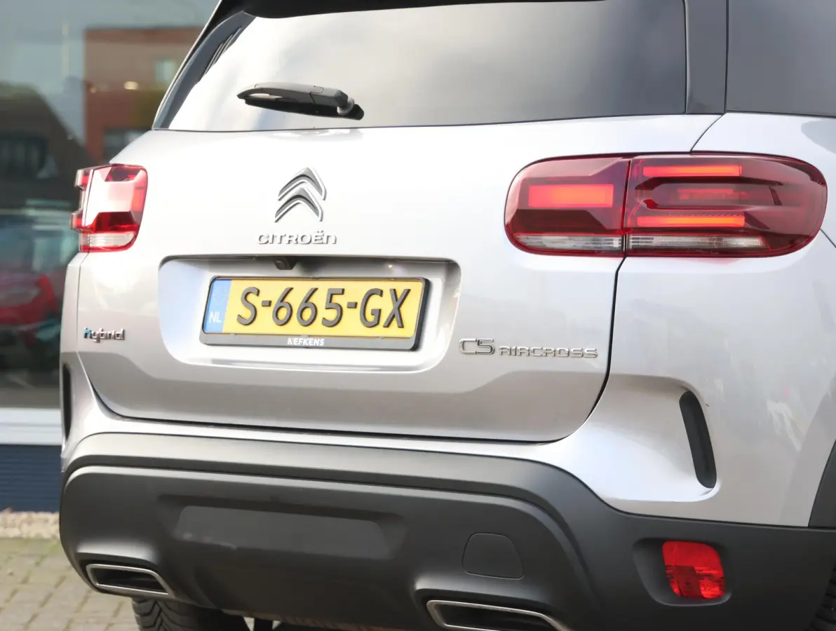 225pk Plug-in Hybrid Feel | 1ste eigenaar | Camera | Dodehoekdetectie | LED lampen | LEER/Stof | 18"LMV | AUTOMAAT
