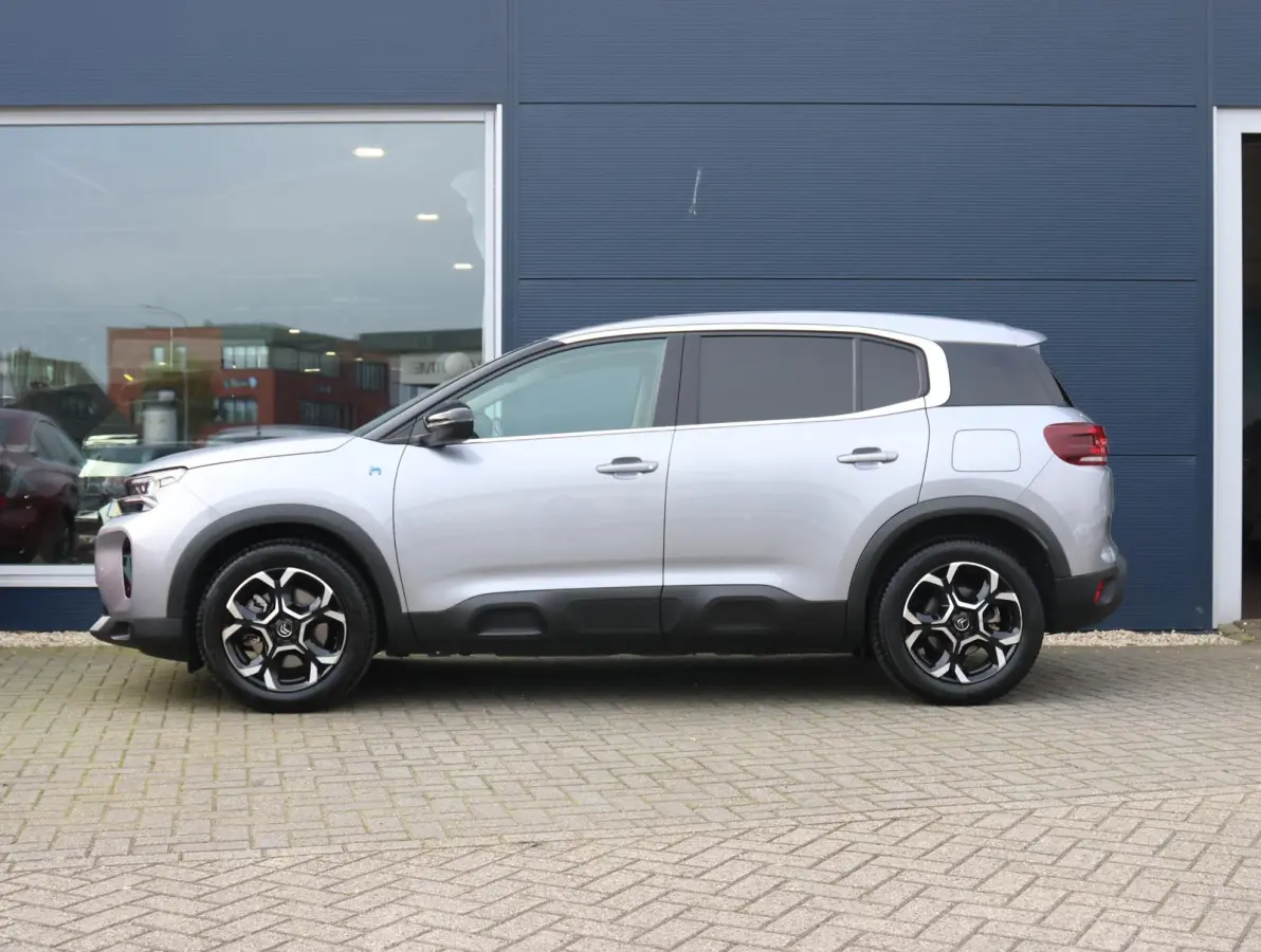 225pk Plug-in Hybrid Feel | 1ste eigenaar | Camera | Dodehoekdetectie | LED lampen | LEER/Stof | 18"LMV | AUTOMAAT