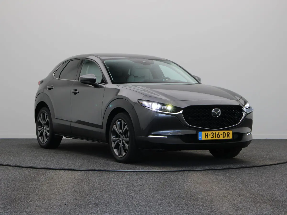 2.0 e-SkyActiv-X M Hybrid Luxury | Trekhaak | Head-up display | elektrische verstelbare stoelen | Stoel-stuurverwarming