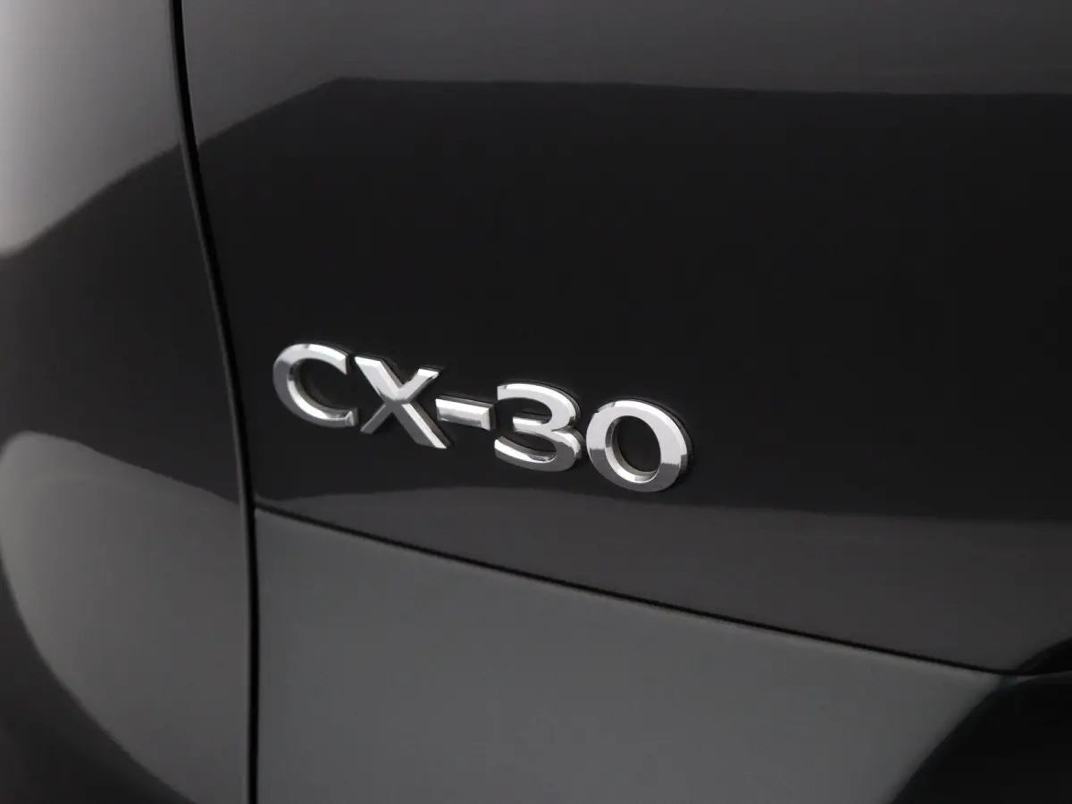 2.0 e-SkyActiv-X M Hybrid Luxury | Trekhaak | Head-up display | elektrische verstelbare stoelen | Stoel-stuurverwarming
