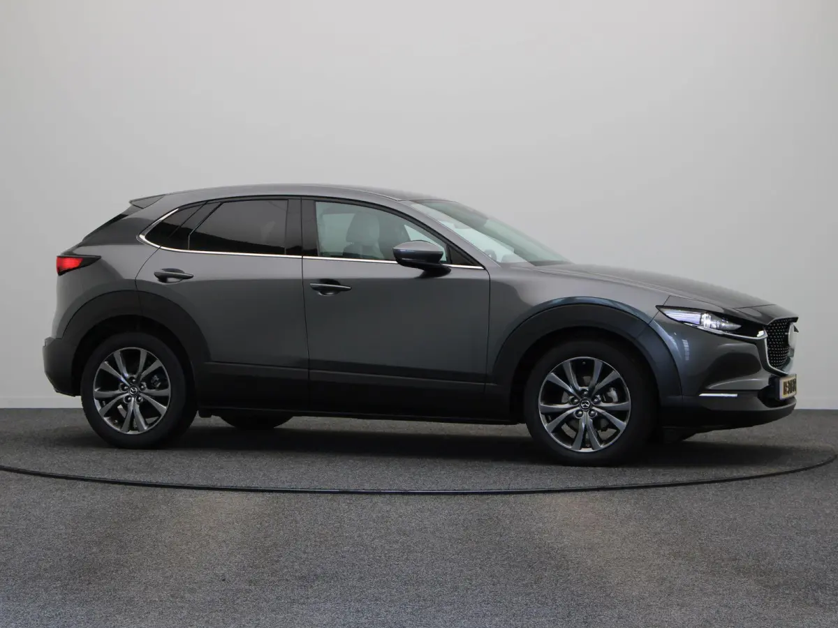 2.0 e-SkyActiv-X M Hybrid Luxury | Trekhaak | Head-up display | elektrische verstelbare stoelen | Stoel-stuurverwarming