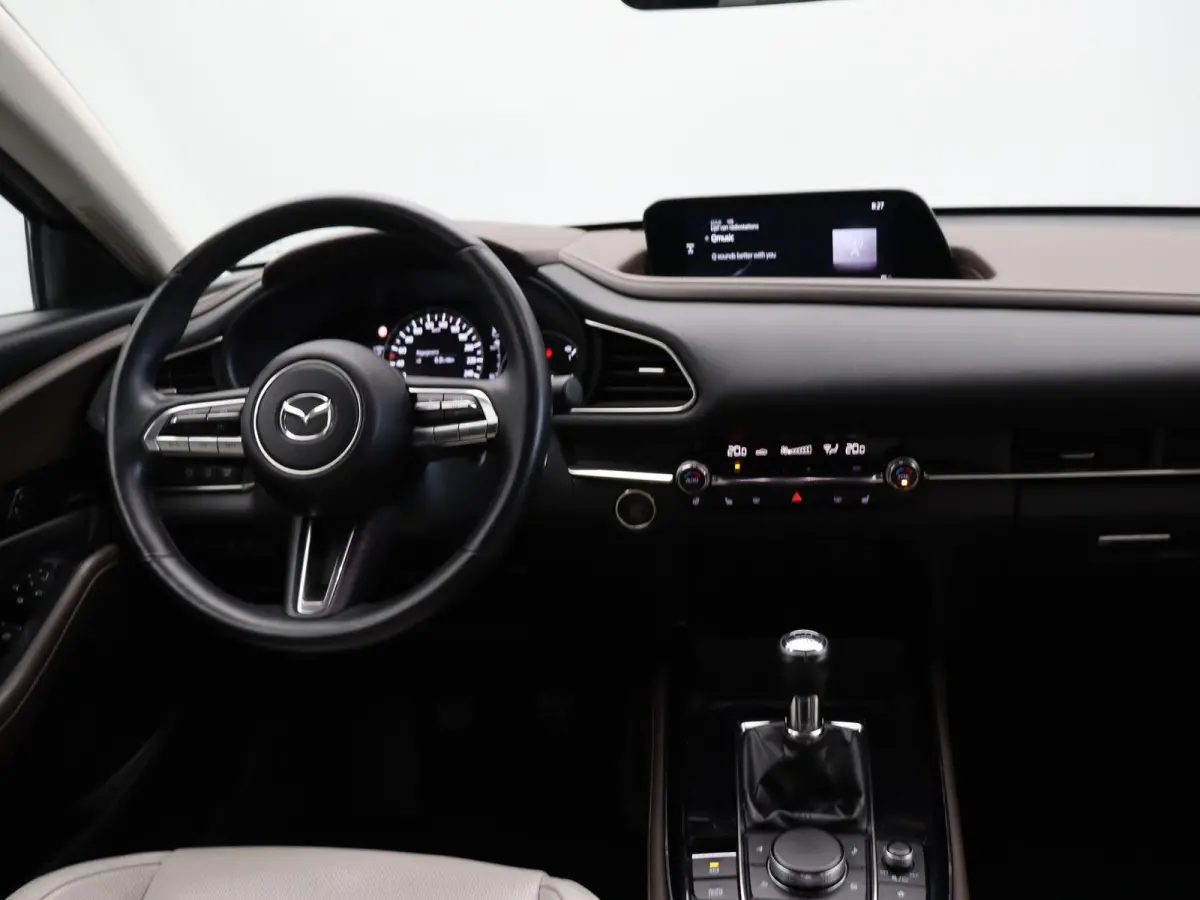 2.0 e-SkyActiv-X M Hybrid Luxury | Trekhaak | Head-up display | elektrische verstelbare stoelen | Stoel-stuurverwarming