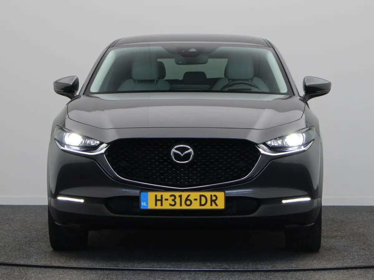 2.0 e-SkyActiv-X M Hybrid Luxury | Trekhaak | Head-up display | elektrische verstelbare stoelen | Stoel-stuurverwarming