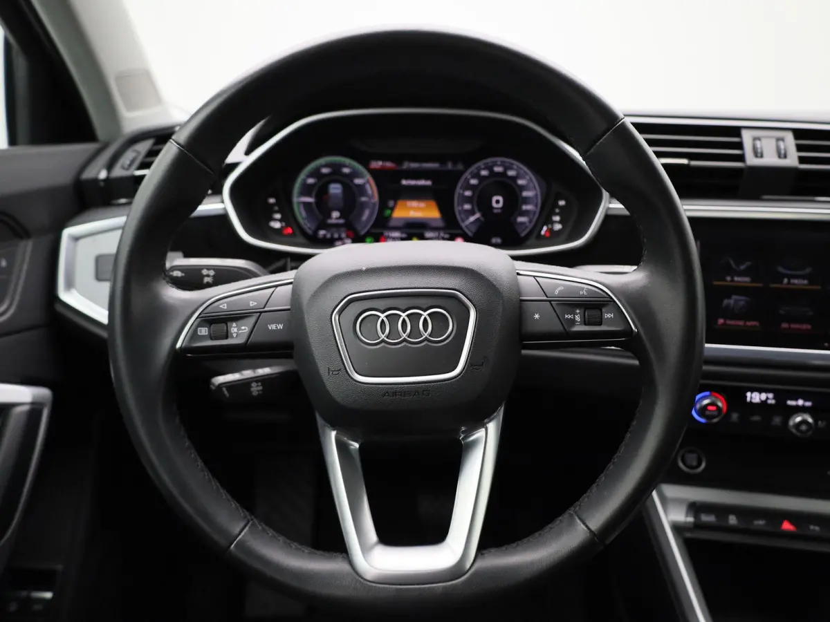 45 TFSI-e S tronic Bus. Ed. Attraction | ACHTERUITRIJCAMERA | ELEKTRISCHE KOFFERKLEP | STOELVERWARMING | LEDER | CLIMATE CONTROL | CRUISE CONTROL |
